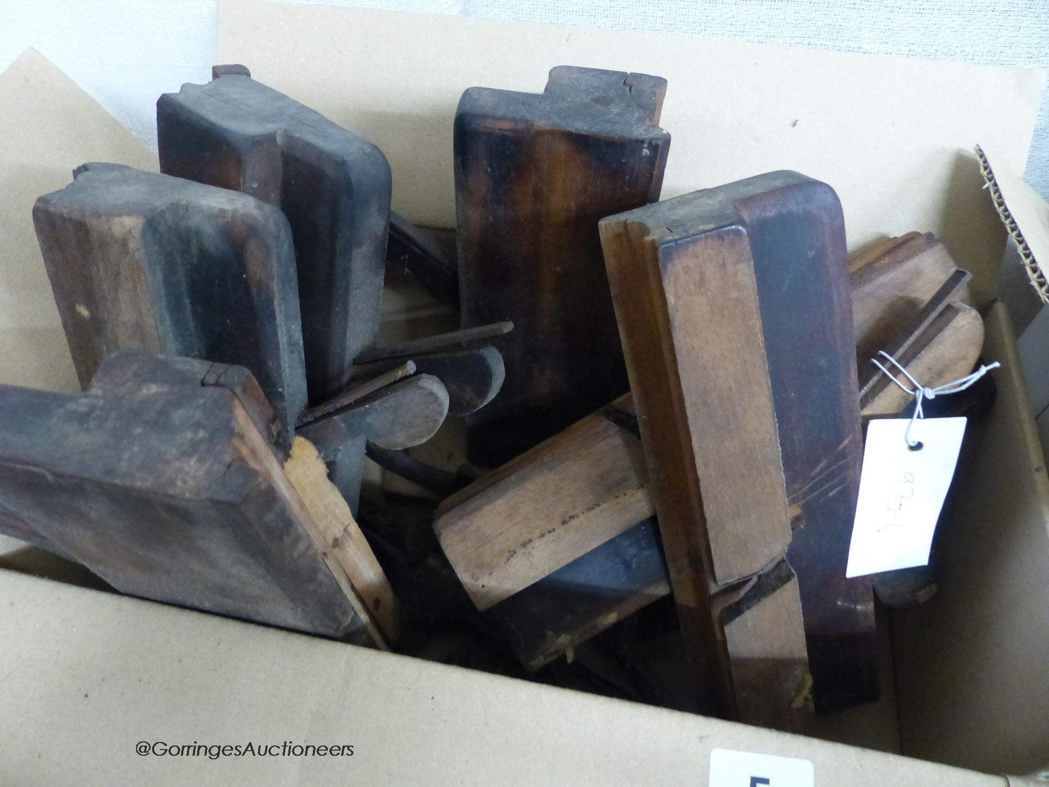 A collection of approximately 24 assorted Victorian beech moulding planes